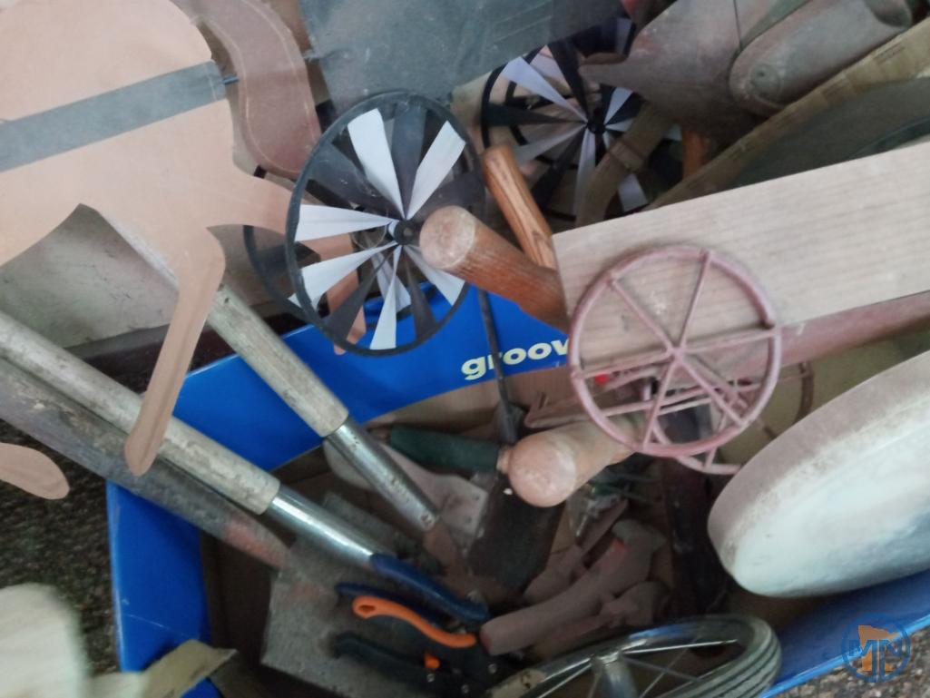 Garden tools: thermometer, seed spreader, waterer, pruners, wall art
