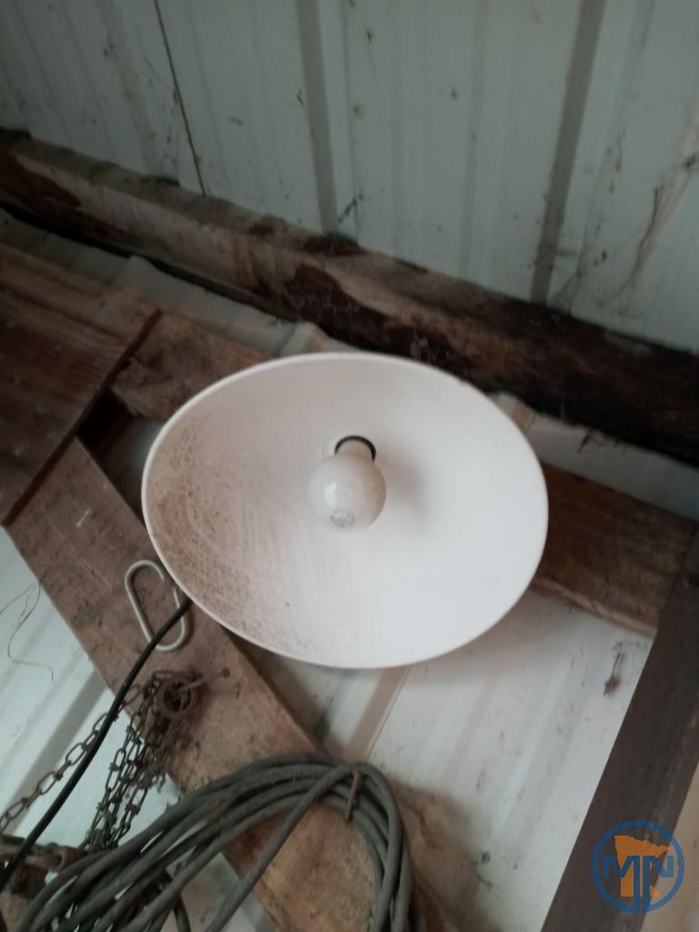 Items along southwest wall of lean-to: