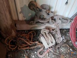 Items along southwest wall of lean-to: