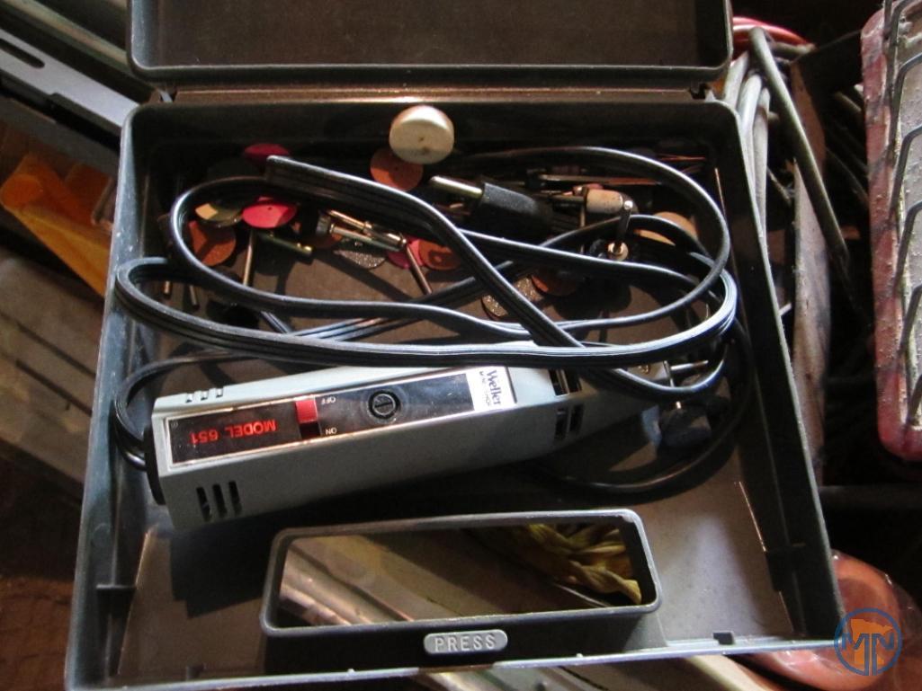 Contents of pallet: wet/dry vacuum, hardware, door thresholds, extension cords, work light