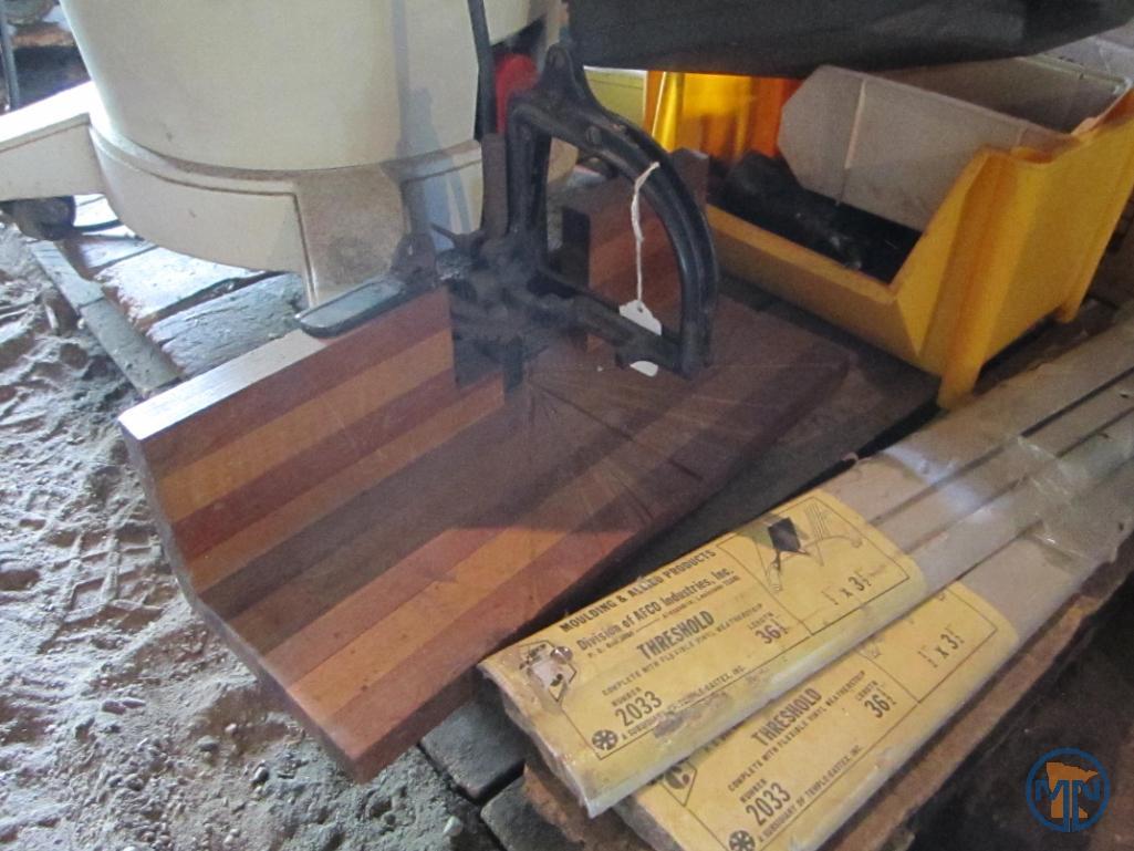 Contents of pallet: wet/dry vacuum, hardware, door thresholds, extension cords, work light