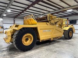 1977 John Deere 762 Paddle Scraper