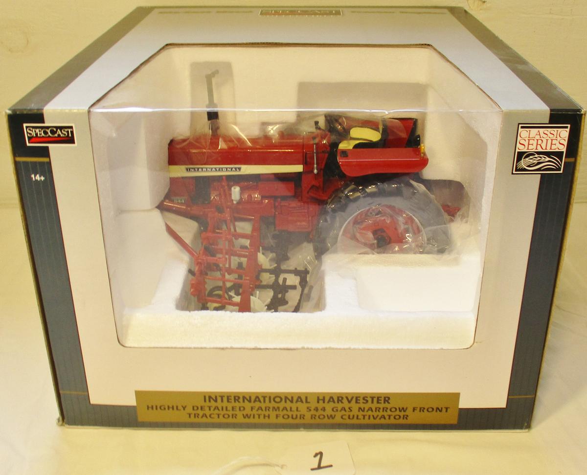 IH Farmall 544 with picker