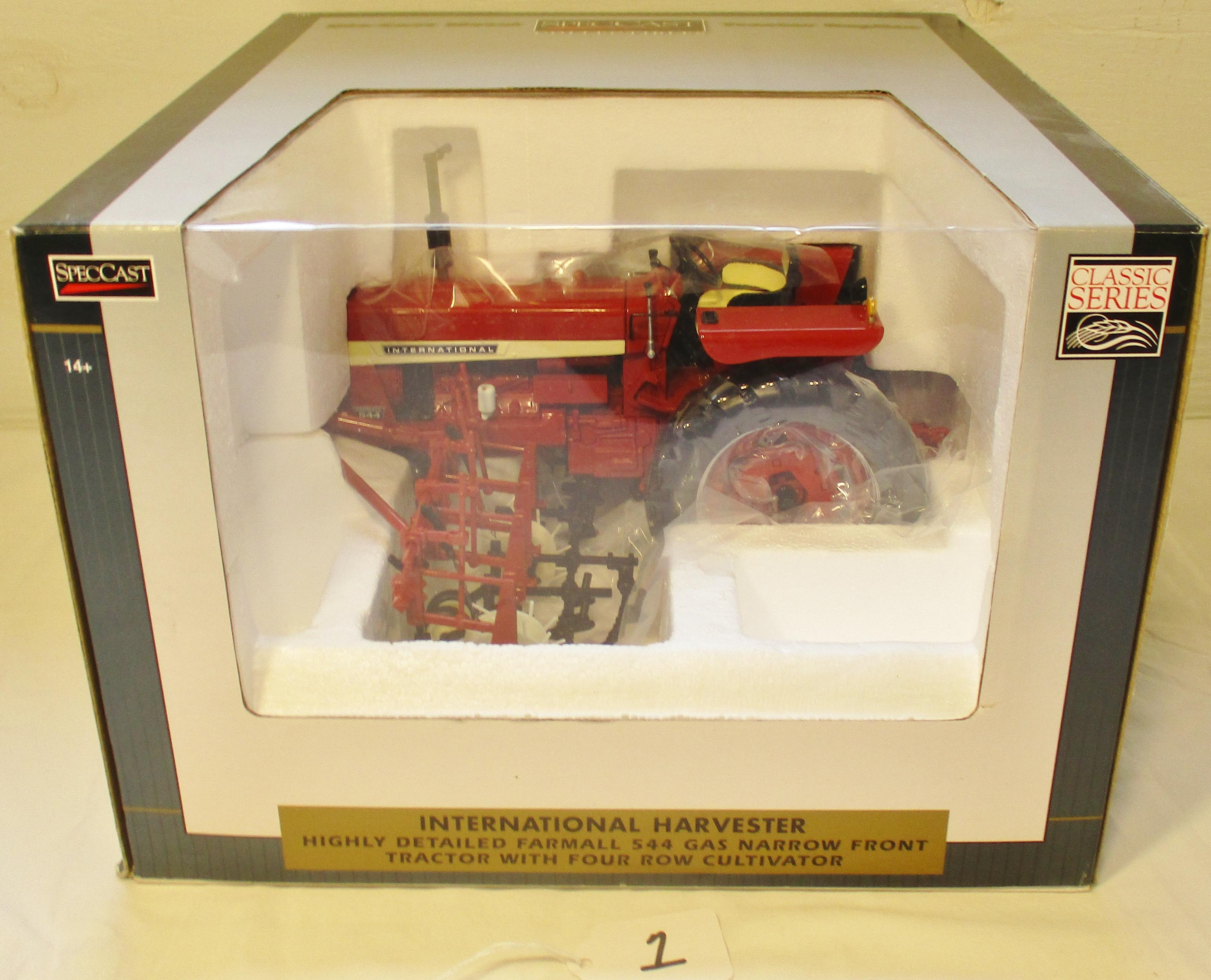 IH Farmall 544 with picker