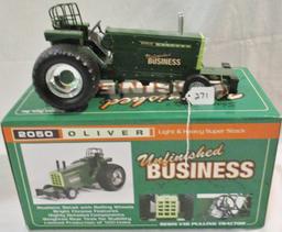 "Unfinished Business" pulling tractor