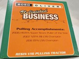 "Unfinished Business" pulling tractor
