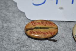 Pair of Remington Pin Backs – 1st is 7/8” in Diameter – “UMC” “Shoot .22 Smokeless Cartridges” – 2nd