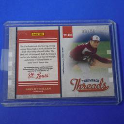 2009 DONRUSS ELITE SHELBY MILLER AUTOGRAPHED PATCH CARD #D 08/50
