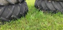 2 Items- set of bolt on tractor rims/dual and tires