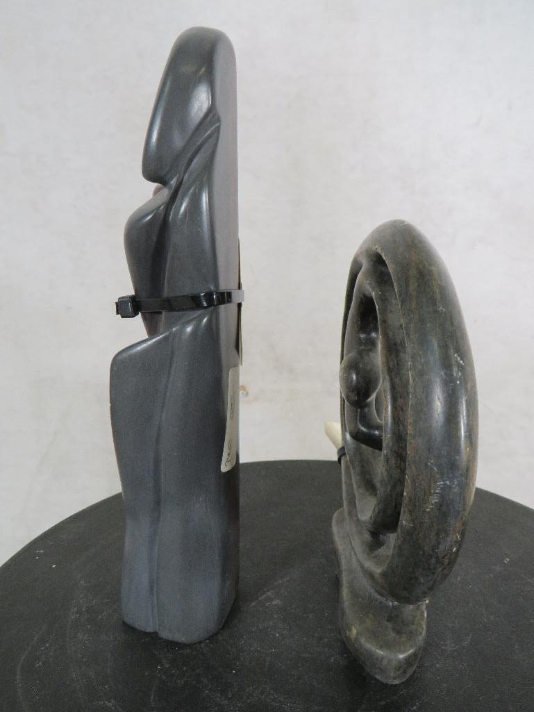 Item on left: The stone most commonly used by Zimbabwean sculptors is a grey, soft soapstone Steati