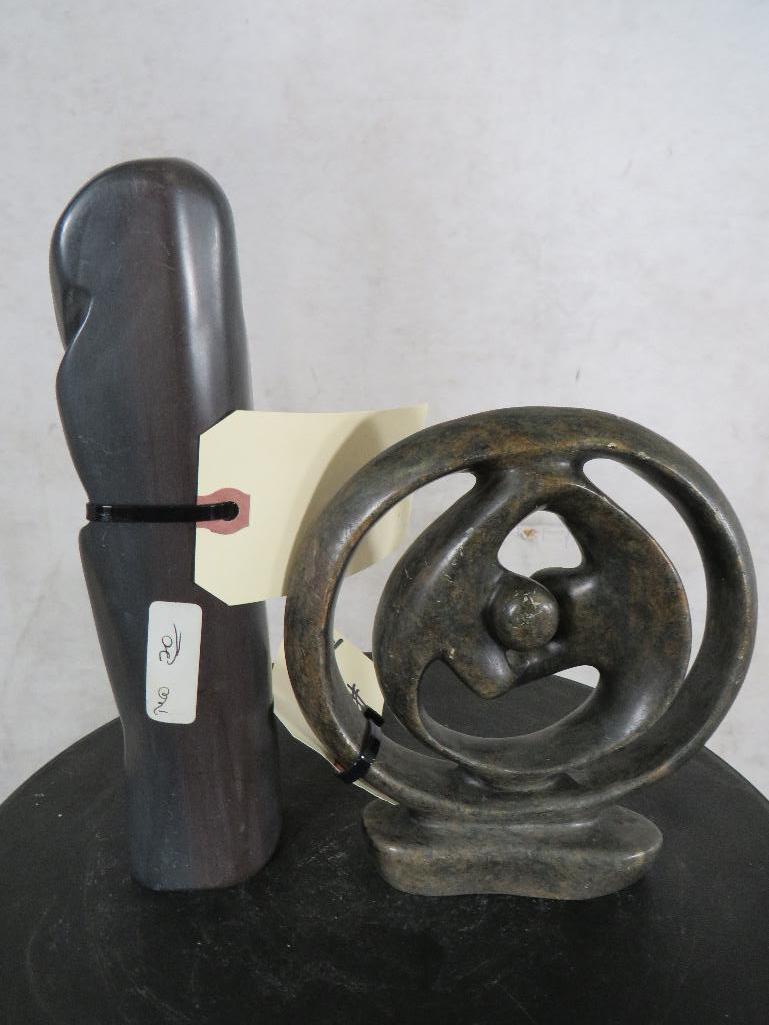 Item on left: The stone most commonly used by Zimbabwean sculptors is a grey, soft soapstone Steati
