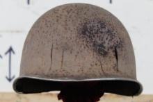 Original (Early) WW2 Fixed Bale U.S. M1 Steel Combat Helmet Shell with Combat Damage