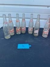 Lot of 7 Vintage Pepsi Cola Soda Bottles