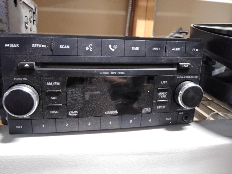 LOT OF CAR PARTS, RADIOS AND MIRRORS