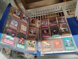 BINDER OF POKEMON AND YU-GI-OH CARDS