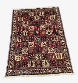 ORIENTAL TYPE AREA RUG MEASURING 9'10 X 7'3