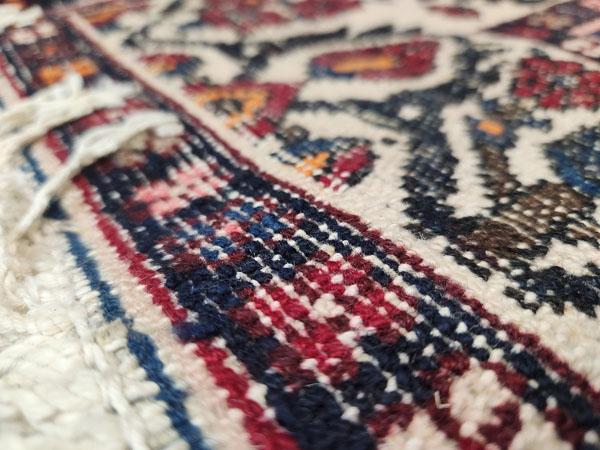 ORIENTAL TYPE AREA RUG MEASURING 9'10 X 7'3