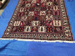 ORIENTAL TYPE AREA RUG MEASURING 9'10 X 7'3