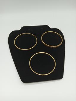 3 Gold Tone Bracelets