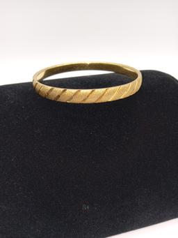 3 Gold Tone Bracelets