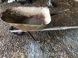 Old wooden handle wheel barrel