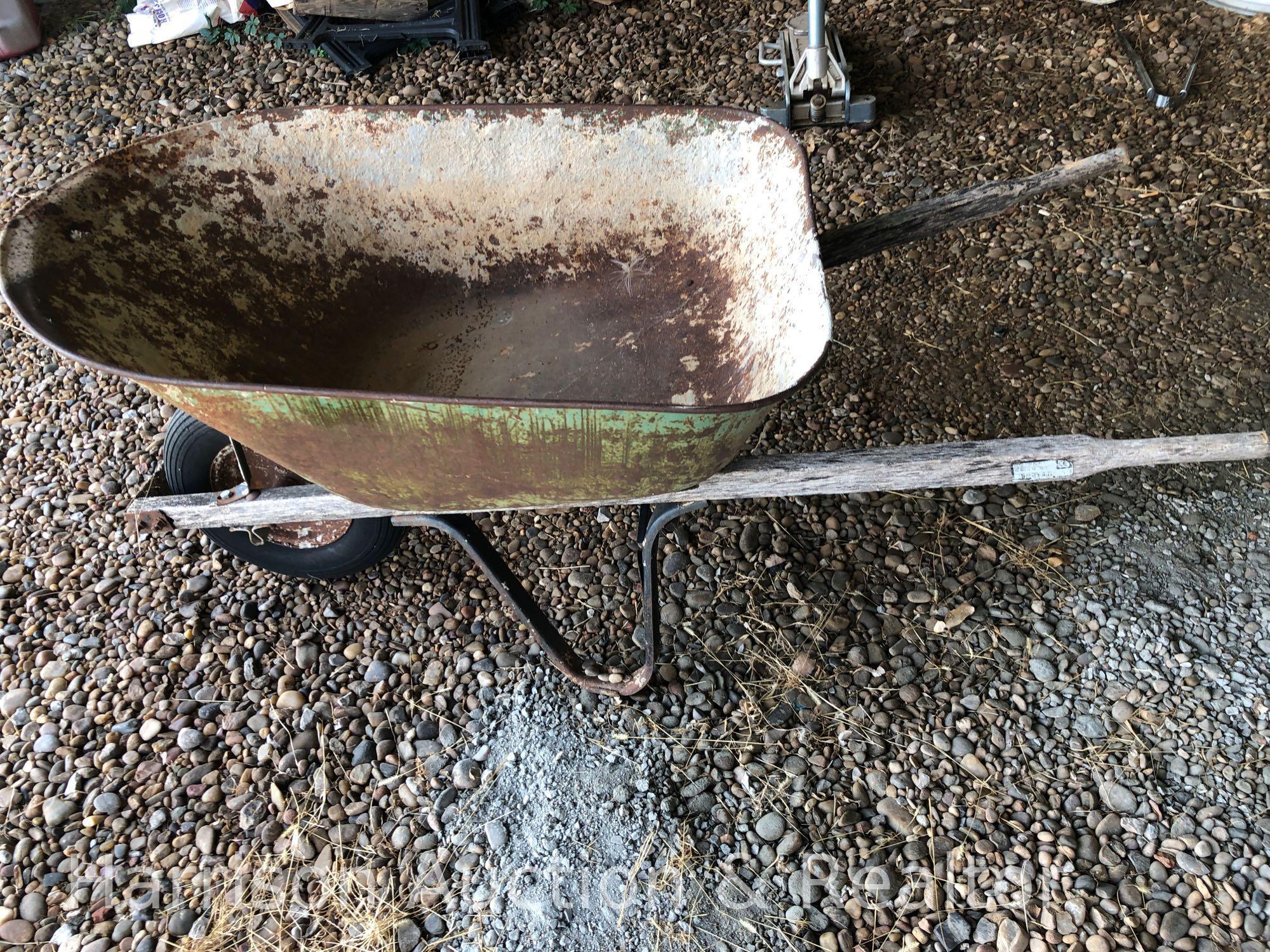 Old wooden handle wheel barrel