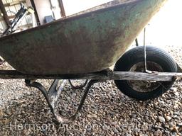Old wooden handle wheel barrel