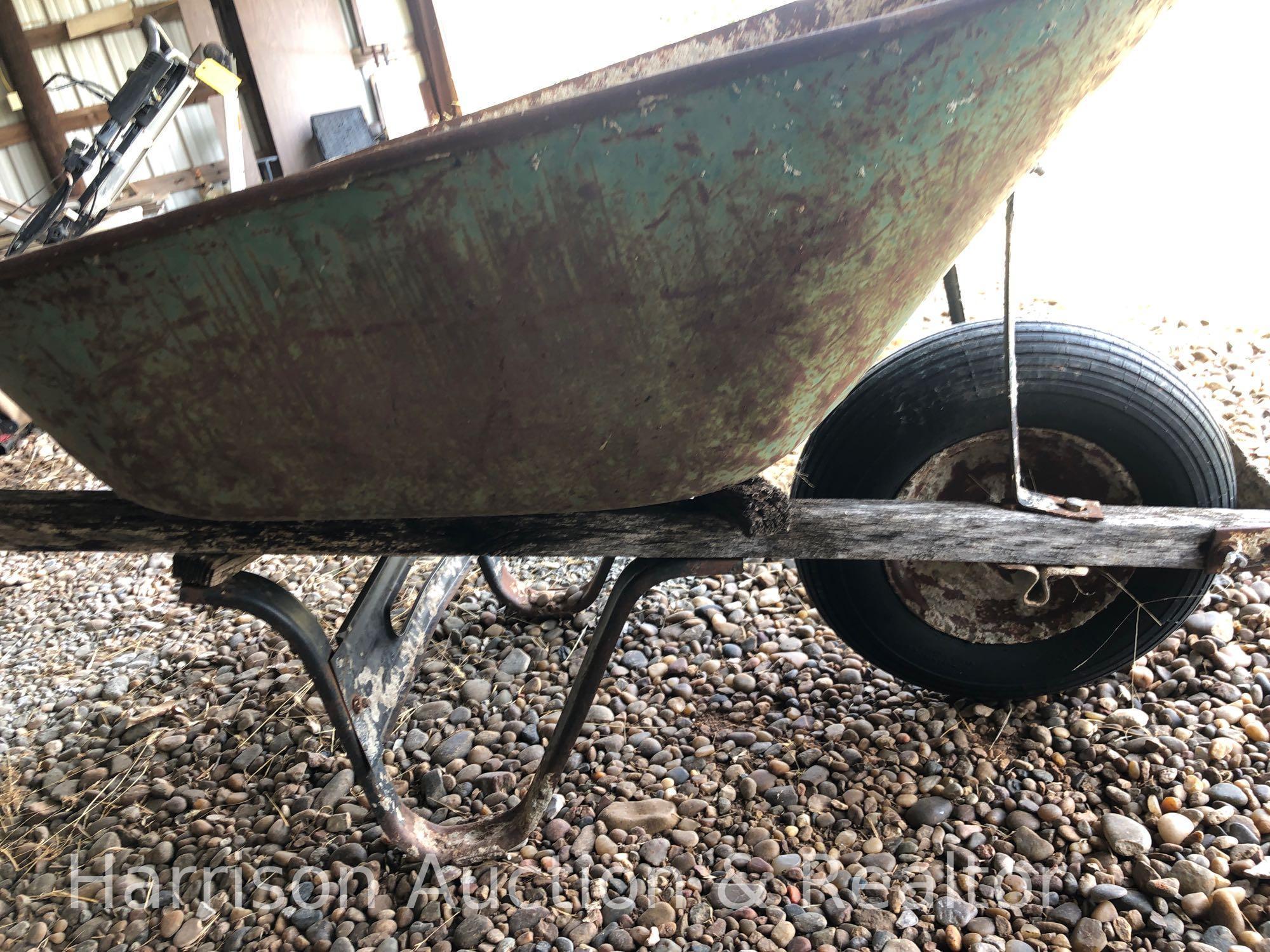 Old wooden handle wheel barrel