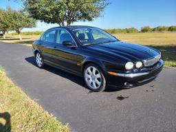 2004 Jaguar X-type. 3.0 V6 engine. Purchase from 89 year old woman here in