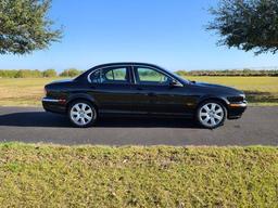 2004 Jaguar X-type. 3.0 V6 engine. Purchase from 89 year old woman here in