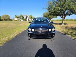 2004 Jaguar X-type. 3.0 V6 engine. Purchase from 89 year old woman here in