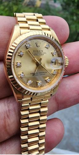 Full 18kt Gold 26mm Factory Diamond Rolex Datejust Comes with Box & Papers