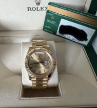 New 18kt Yellow Gold 40mm DayDate Rolex comes with Box & Papers