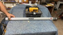 Dewalt laser level with tripod and measuring tool