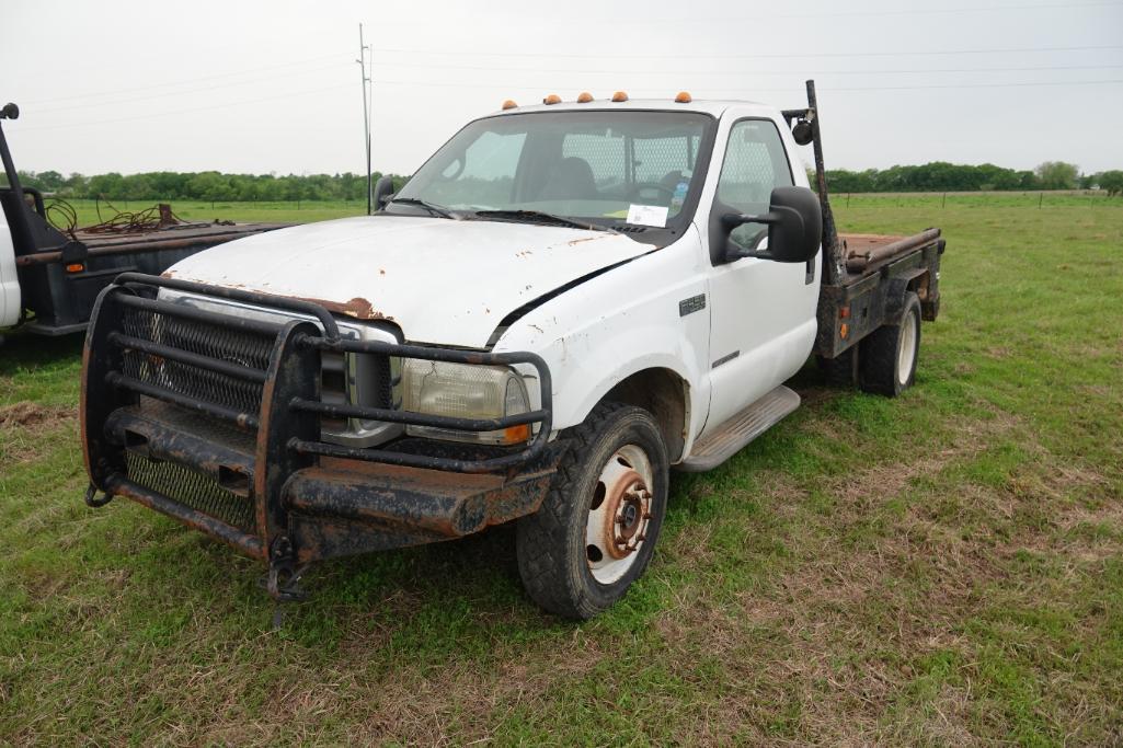 1999 Ford F450 Super Duty power stroke 6 spd manual transmission w/ winch bed (runs and drives)