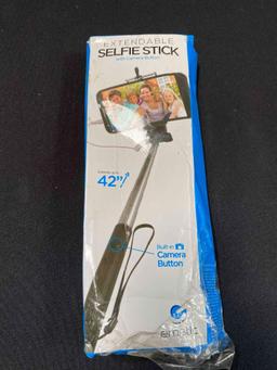 Lot of Smartphone Holders and Extendable Selfie Sticks