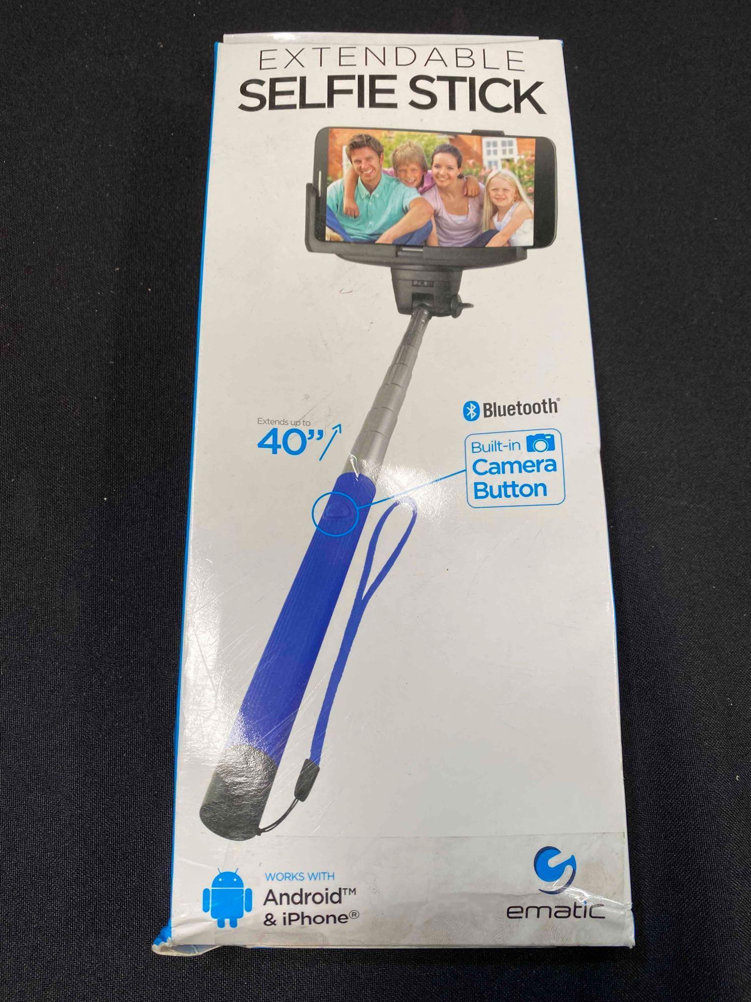Lot of Smartphone Holders and Extendable Selfie Sticks