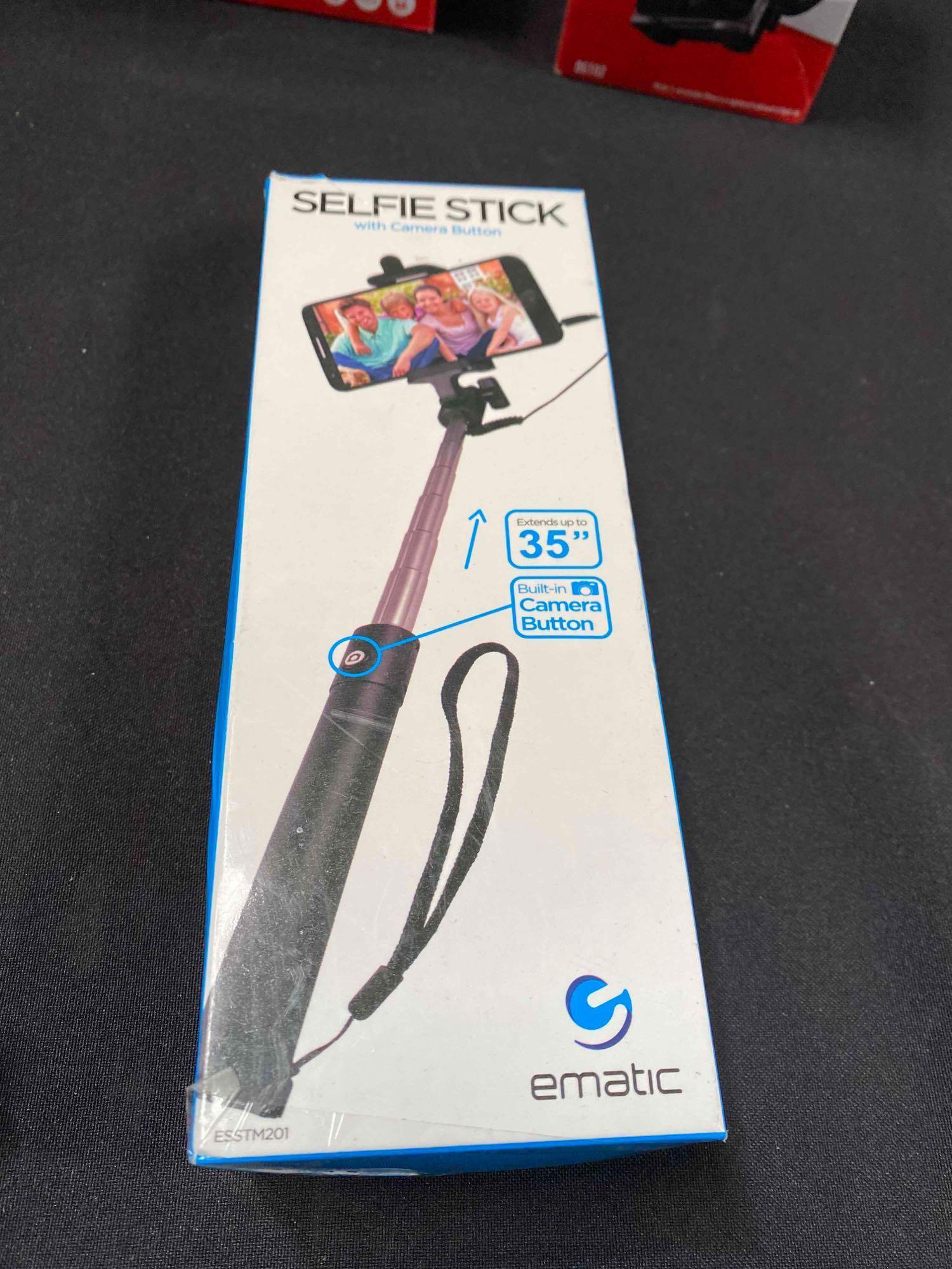 Lot of Smartphone Holders and Extendable Selfie Sticks