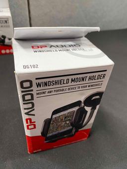 Lot of Smartphone Holders and Extendable Selfie Sticks