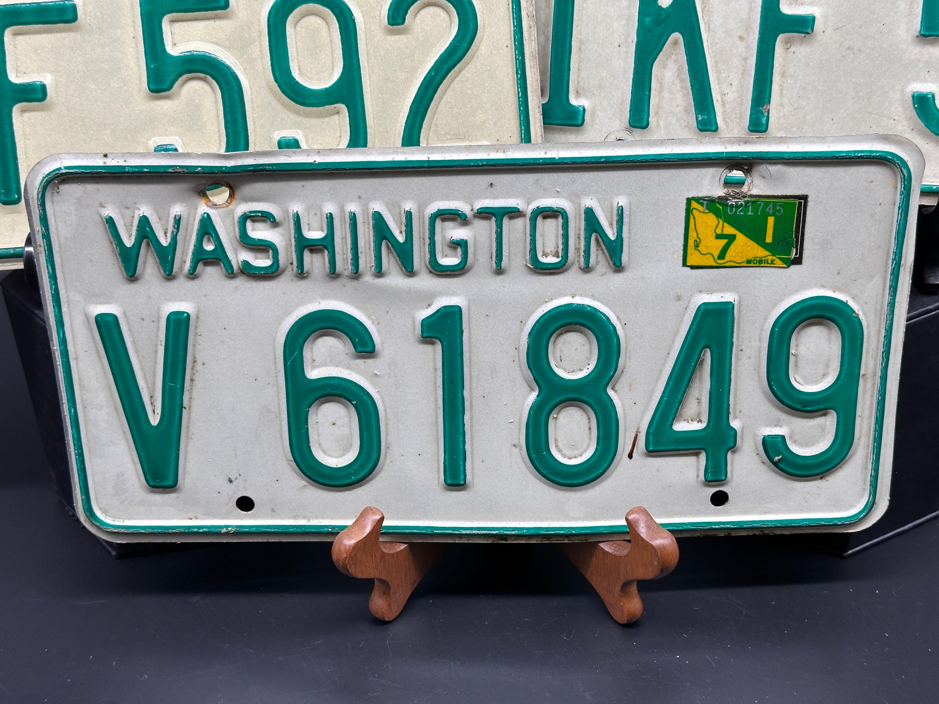 Oregon, Washington and Texas License Plates