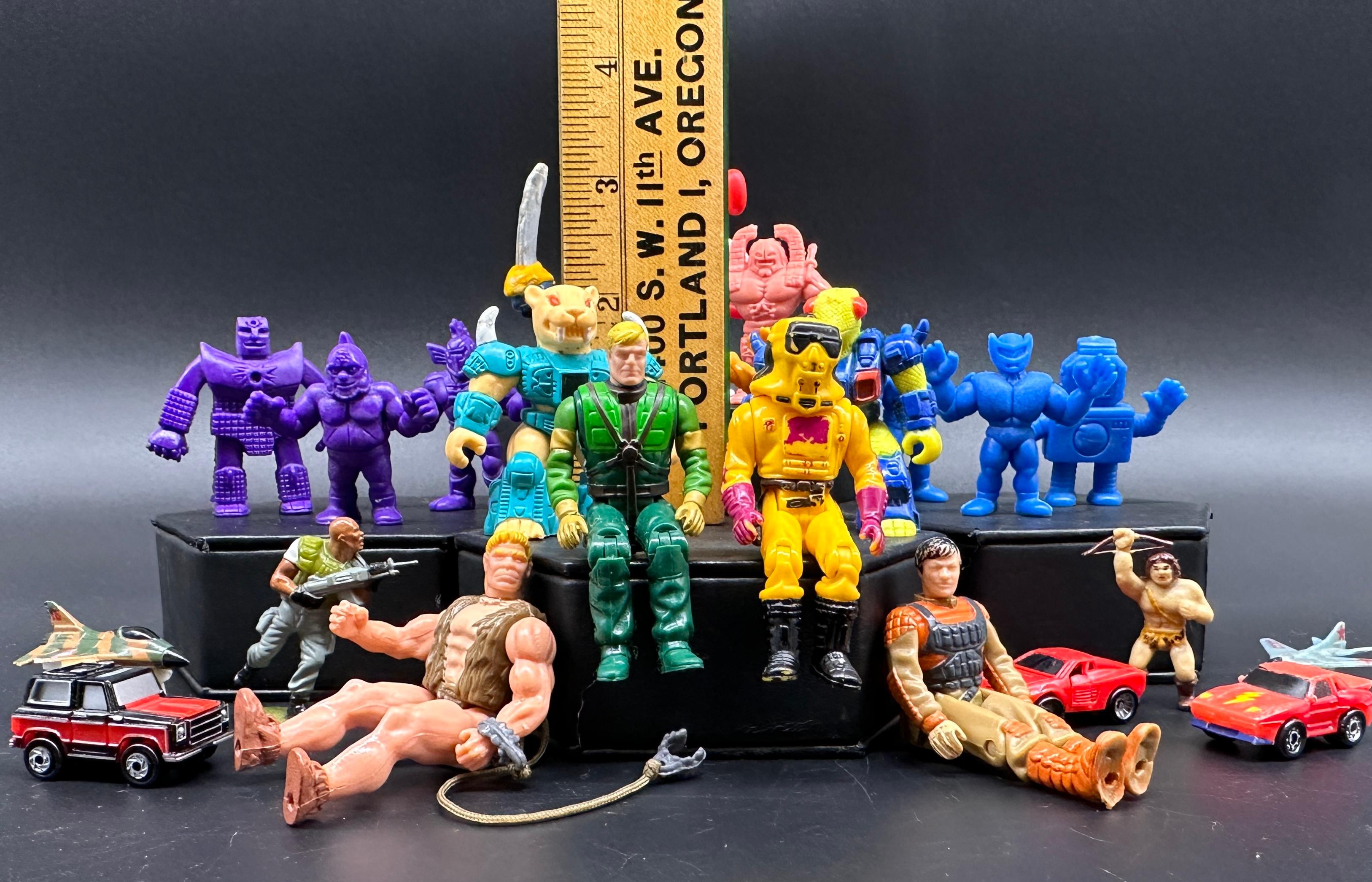 Variety of Vintage Action Figures and Toys