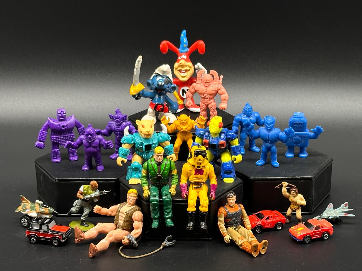 Variety of Vintage Action Figures and Toys