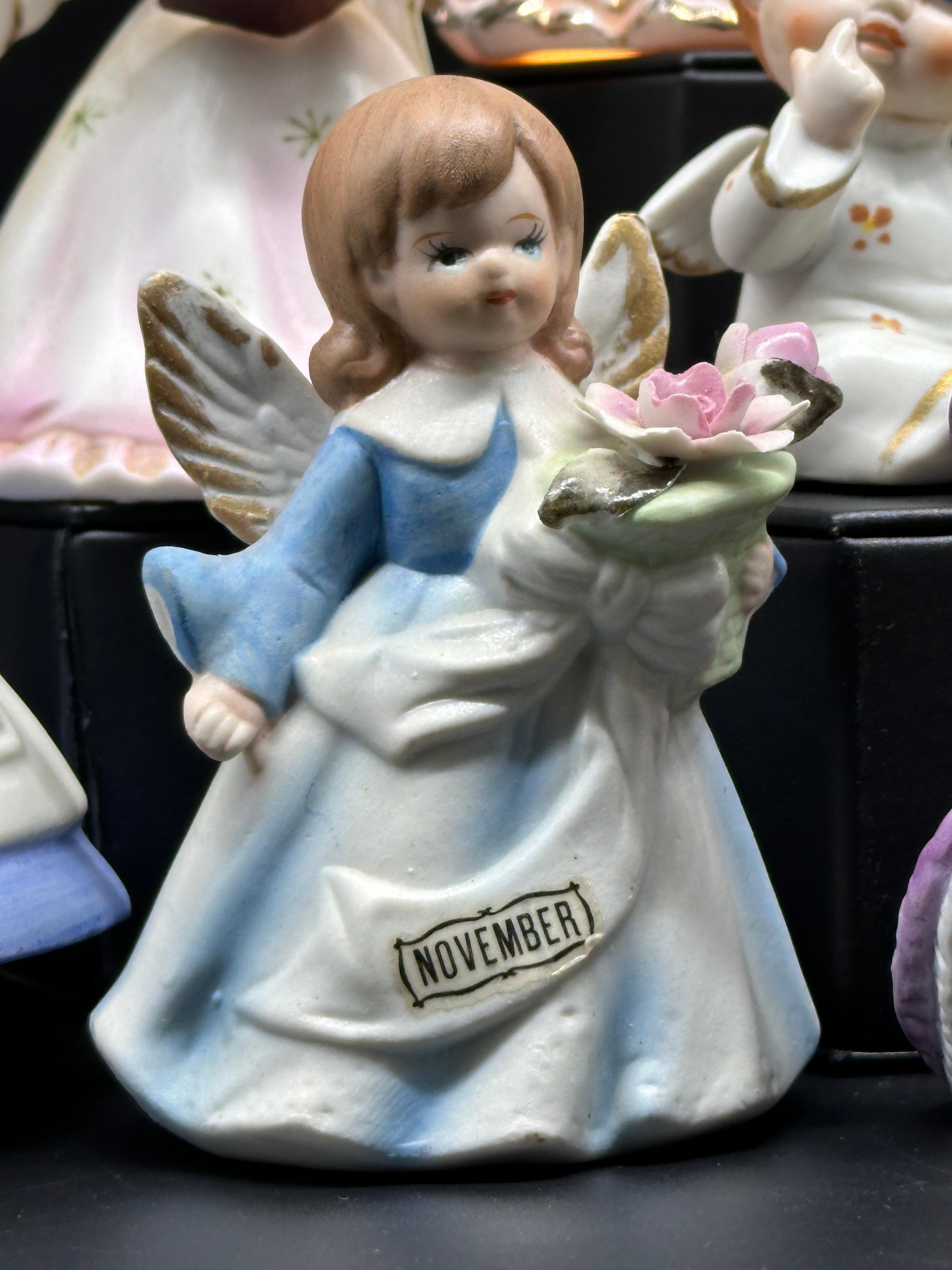 Porcelain Angels and Birthday Figurines