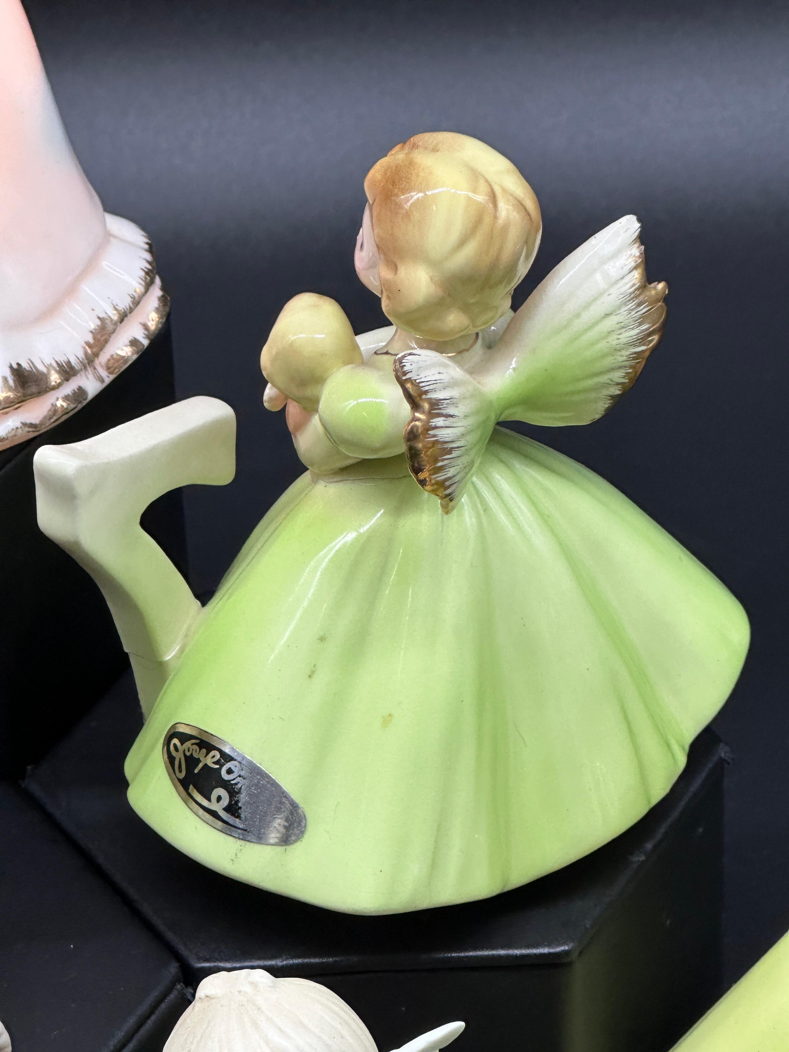 Porcelain Angels and Birthday Figurines