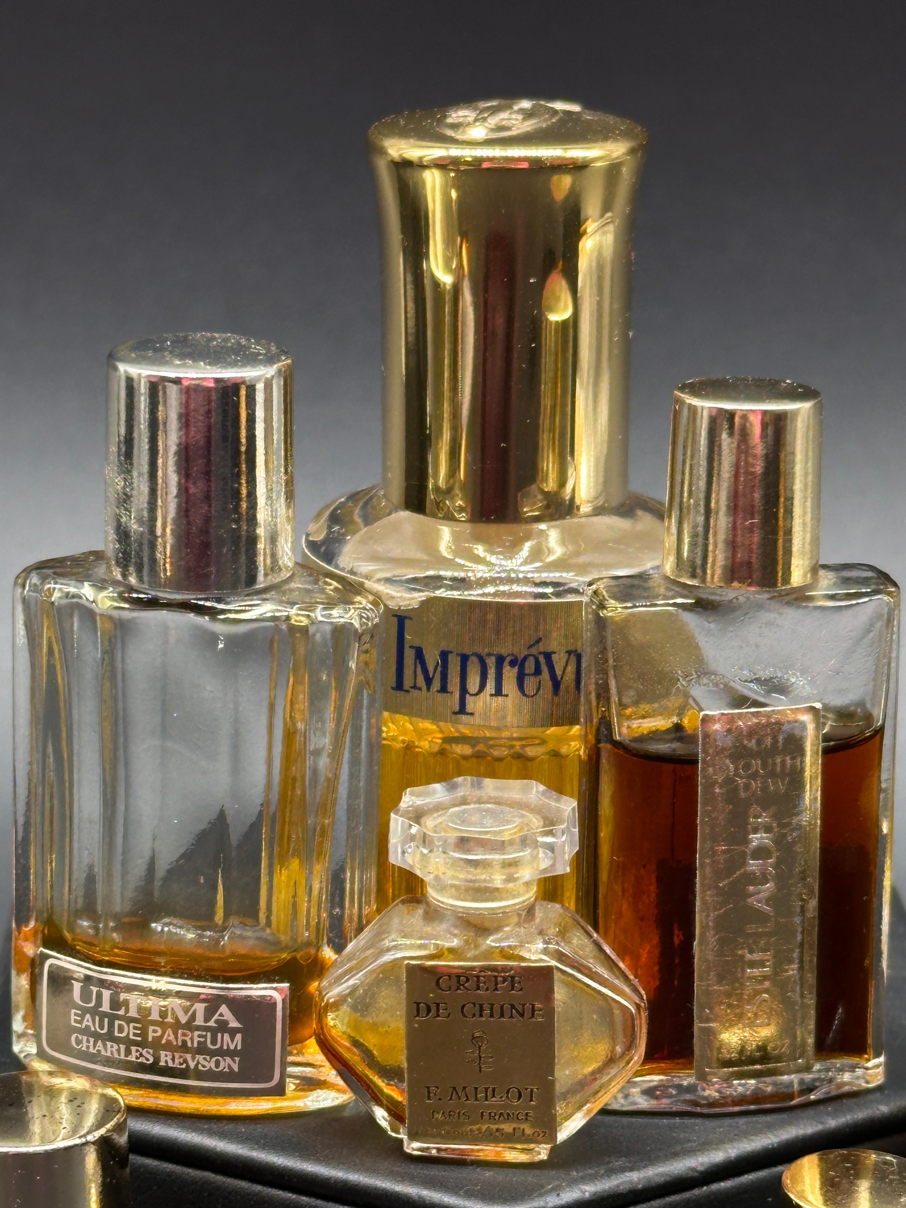 Assortment of Vintage Perfume and Cologne Bottles
