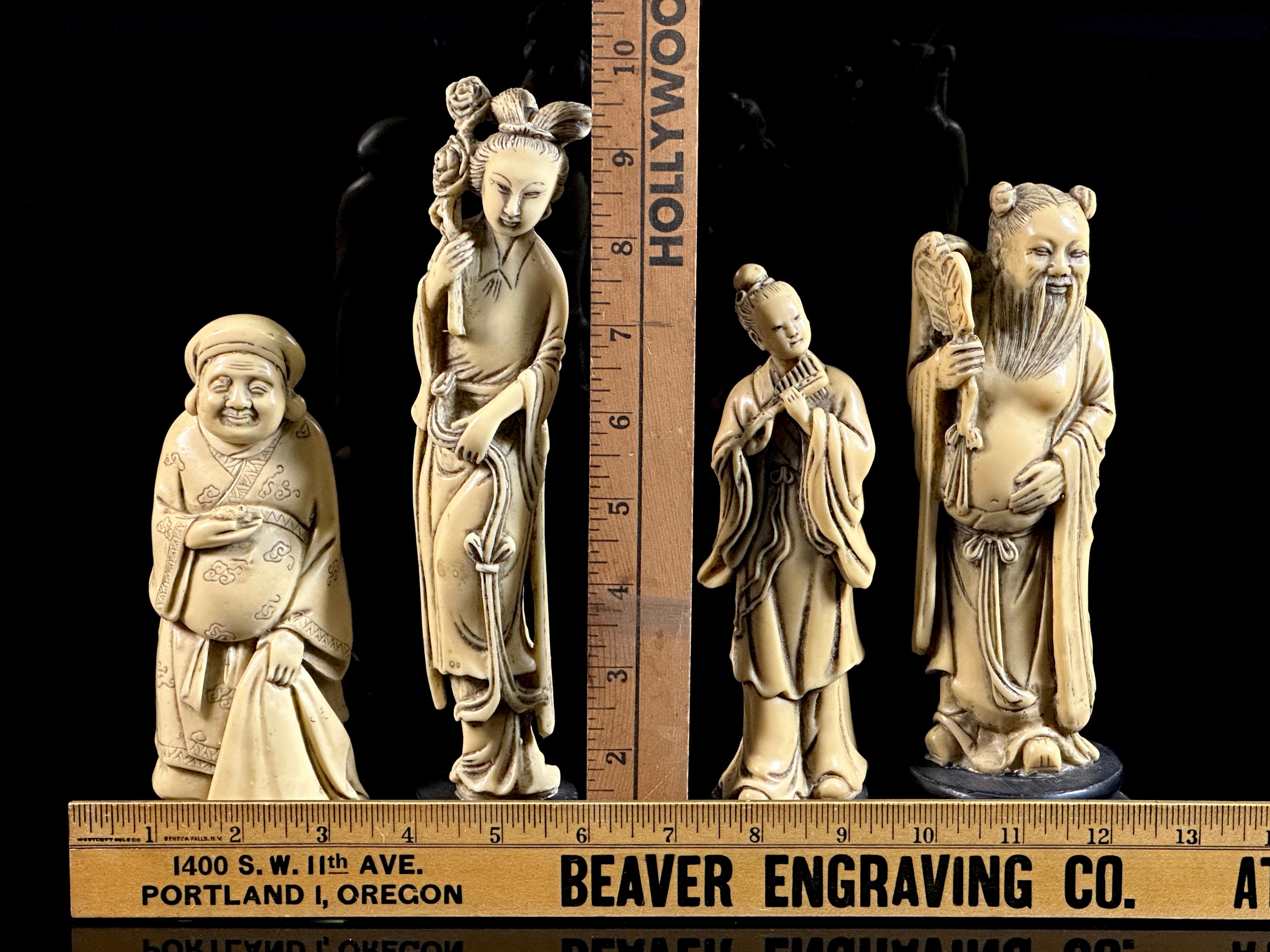 Four Asian Carved Figures