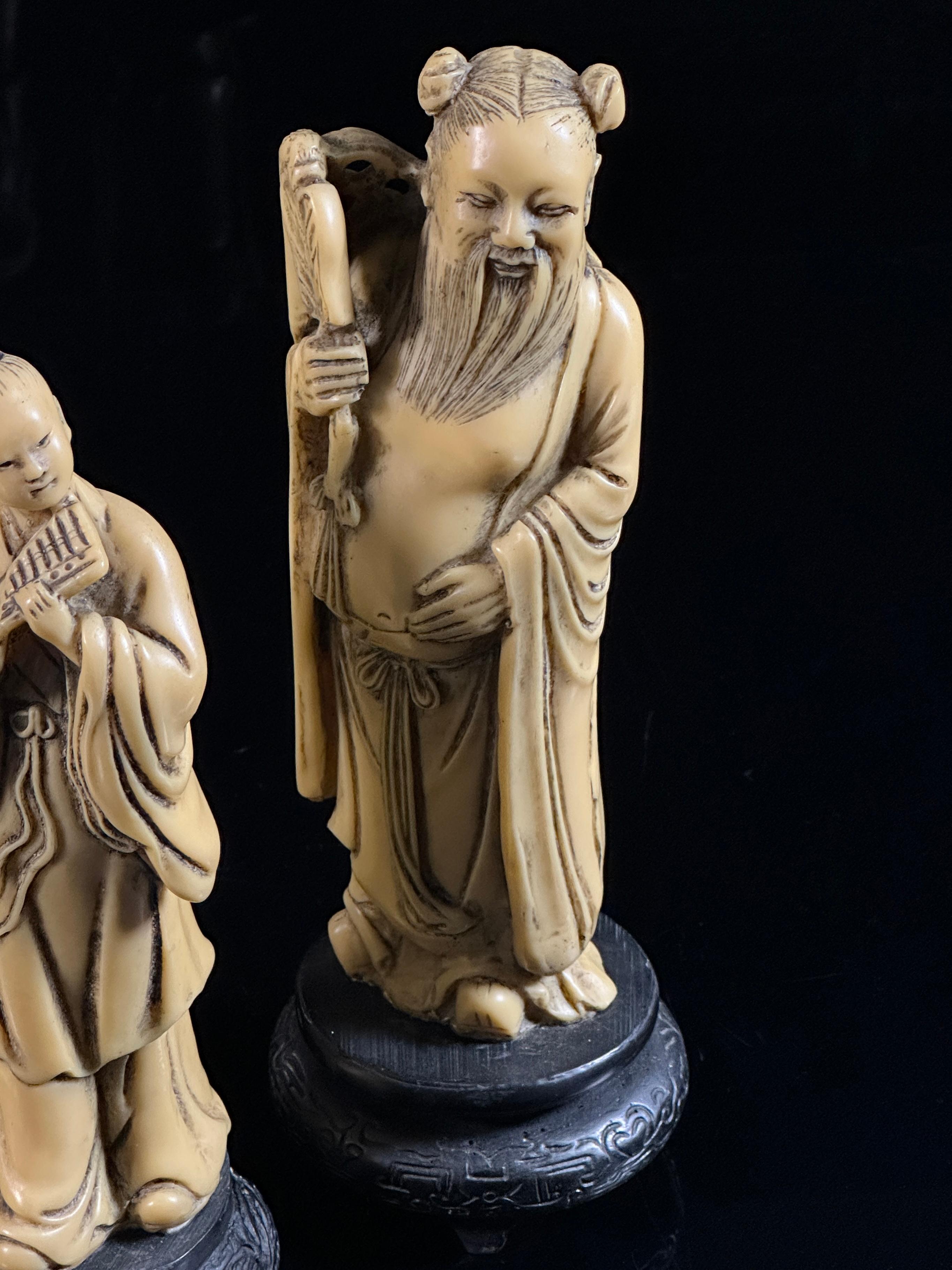 Four Asian Carved Figures