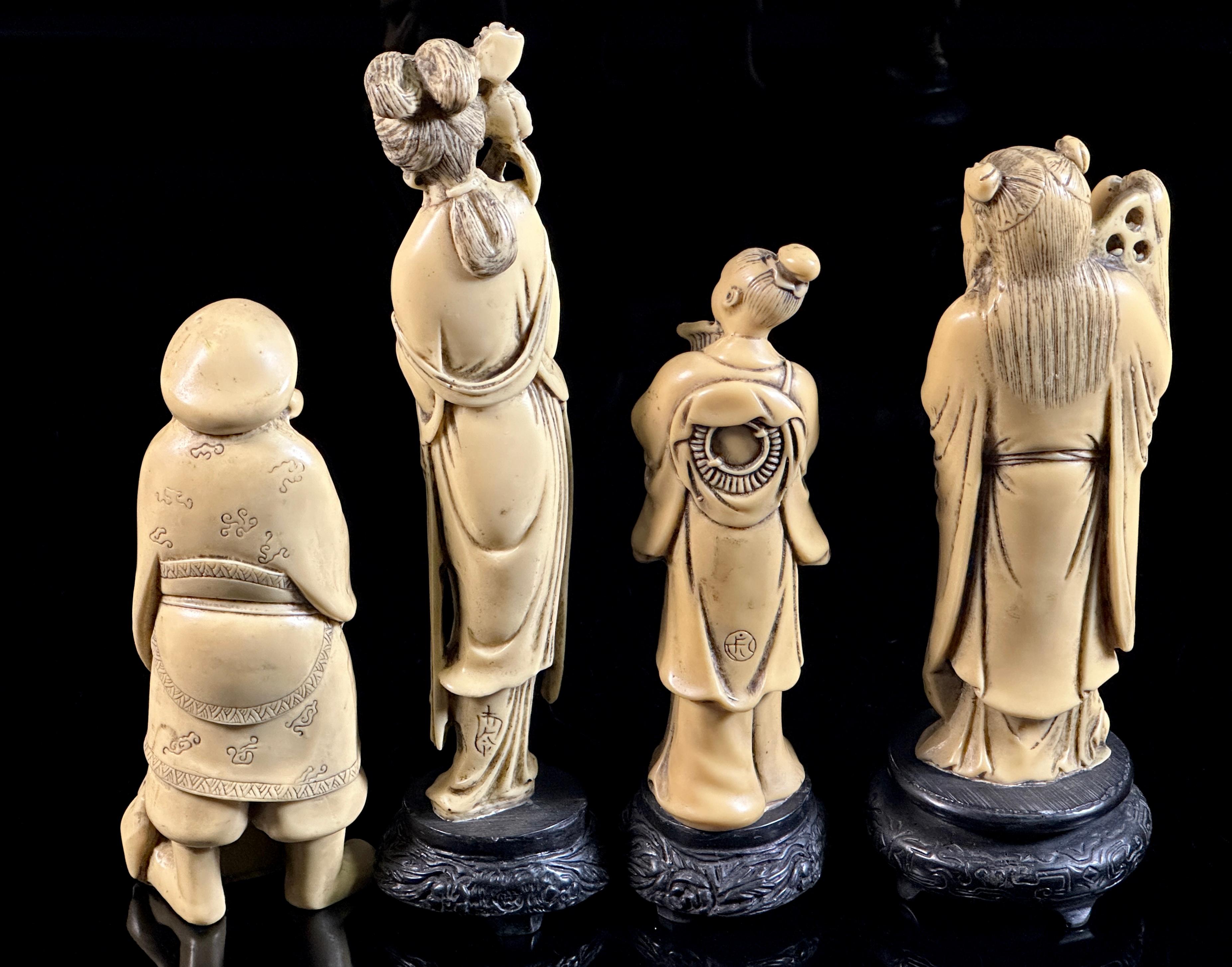 Four Asian Carved Figures