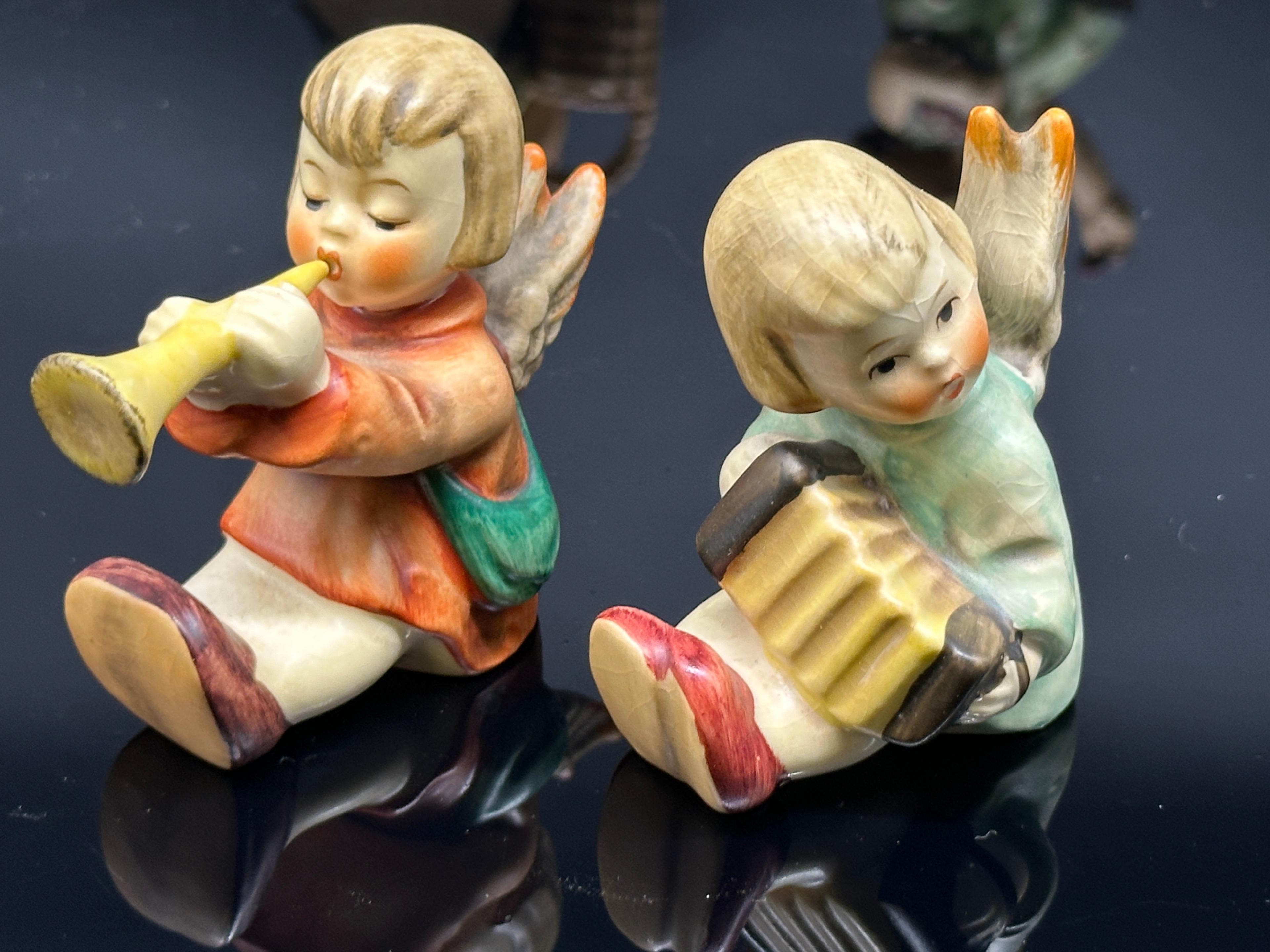 Eight Goebel Hummell Figurines