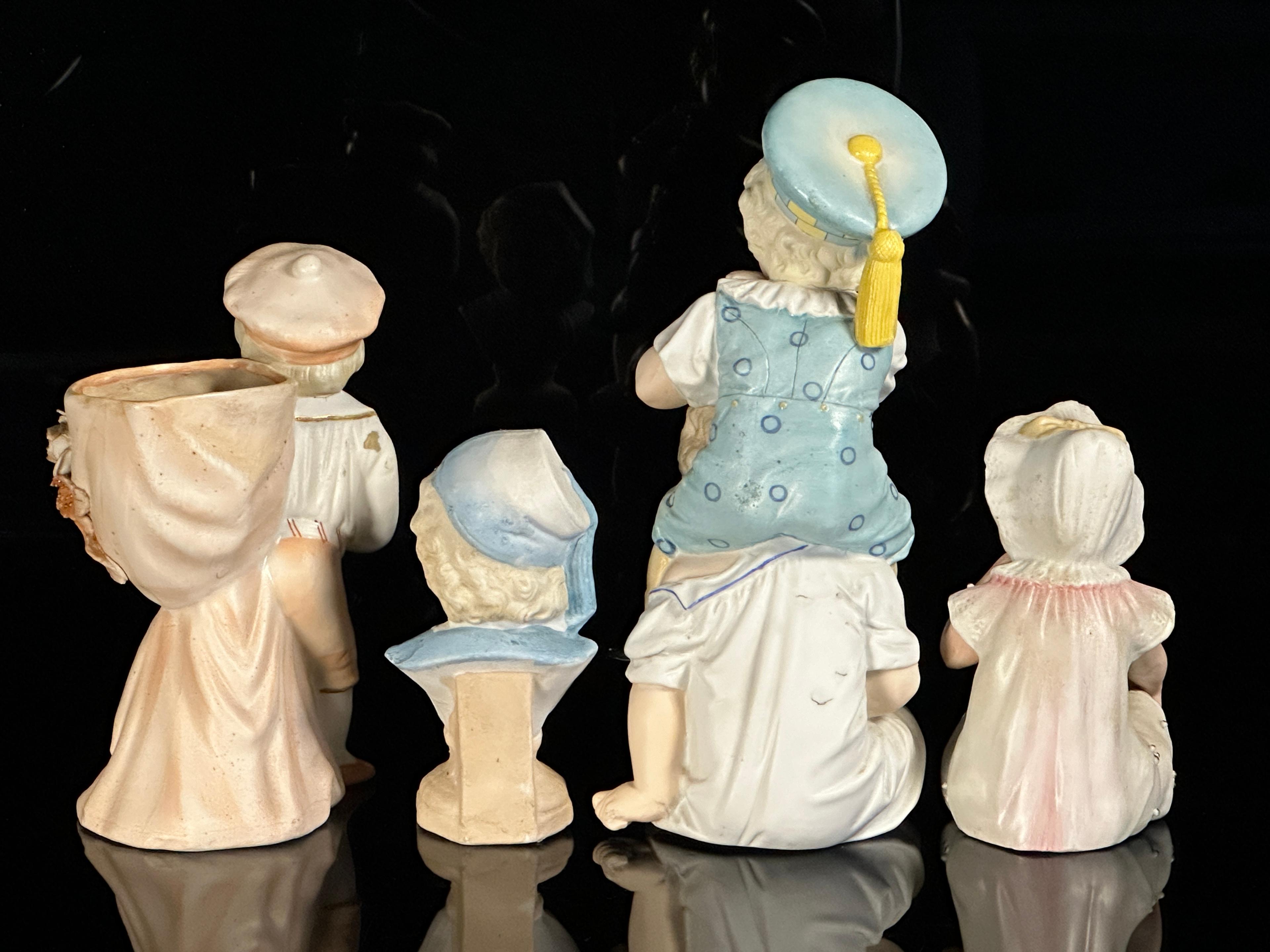 Four German Bisque Figures